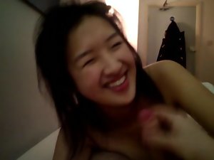 Pretty Asian girl sucking cock before work