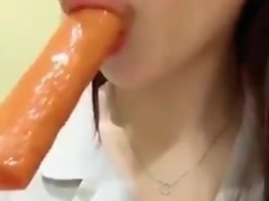 Korean girl sucking an ice lolly