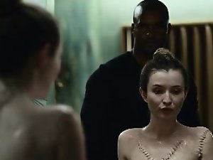 Emily Browning shows some boobs