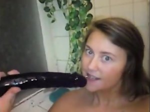 Submissive slut deepthroats big dildo