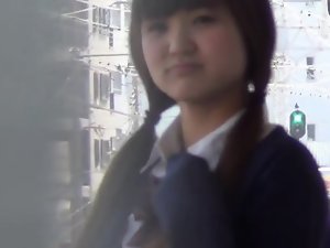 Asian teen rubbing clit